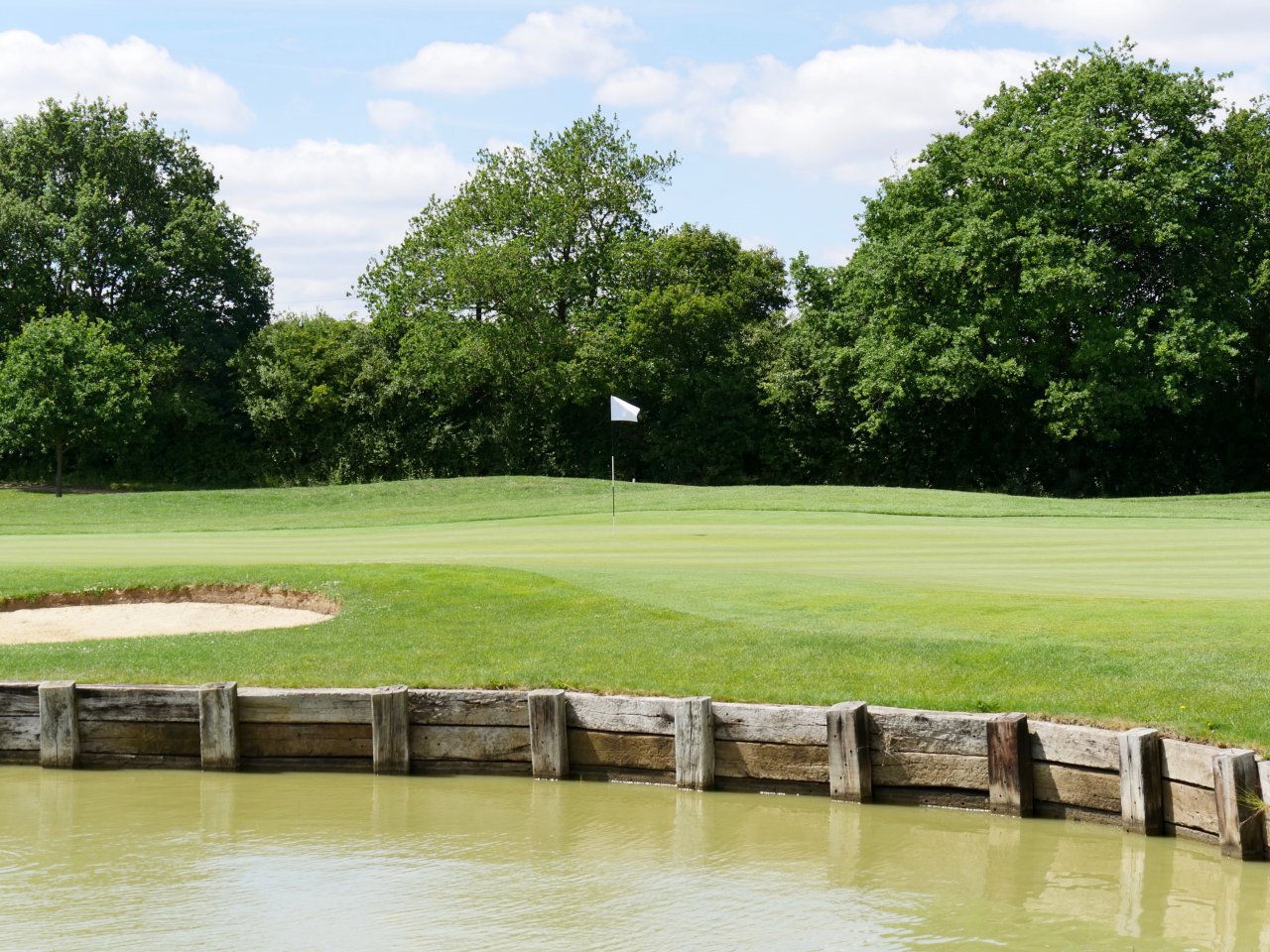Requiring precision and finesse to hit the green, which is guarded by a deep bunker and a lake!