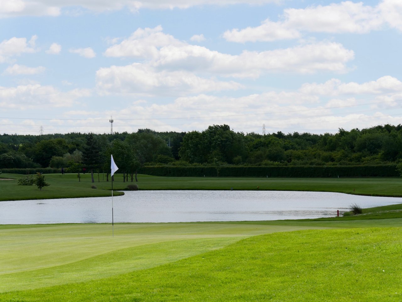 Requiring precision and finesse to hit the green, which is guarded by a deep bunker and a lake!
